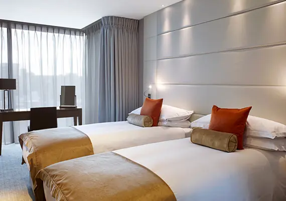 A typically bright twin room at Cheval Three Quays