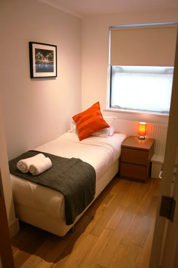 A single bedroom at Chatsworth Apartments