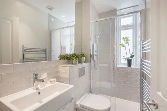 Lovely decorative touches in the shower room