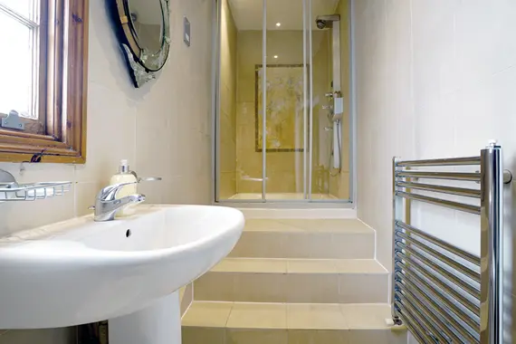A modern shower room in the standard one bedroom apartment