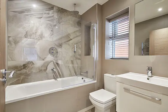 Relax and have a bubble bath in this stunning bathroom