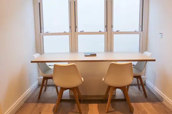 A beautiful dining room table suitable for four