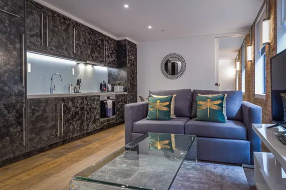 A spacious lounge area and fully equipped kitchen