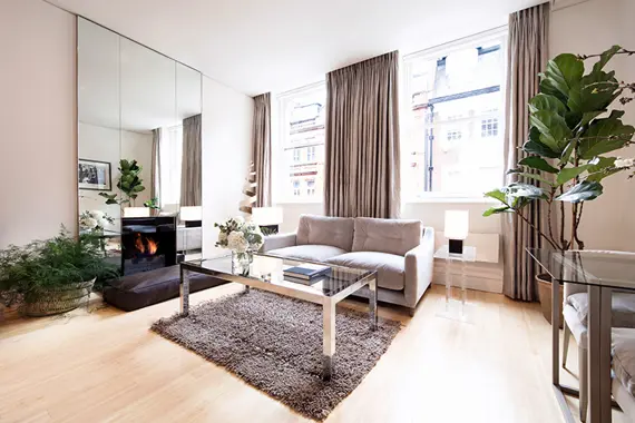 A stunning fireplace in the deluxe one bedroom apartment