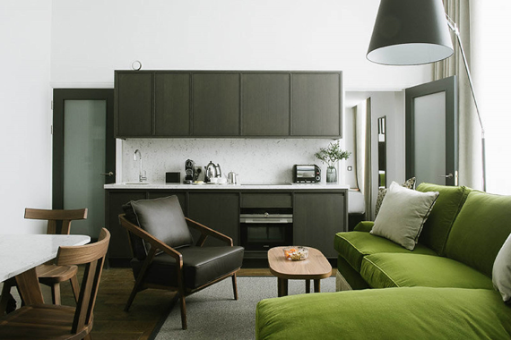 A spacious and bright fully equipped kitchen and lounge area