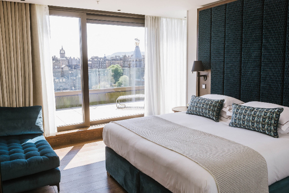 A beautiful and comfortable bedroom with views