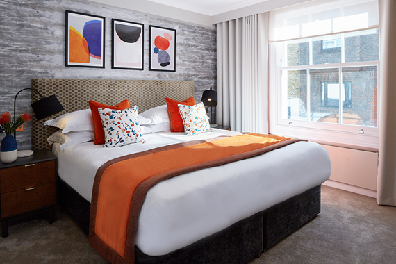 A townhouse with a bright and colourful bedroom