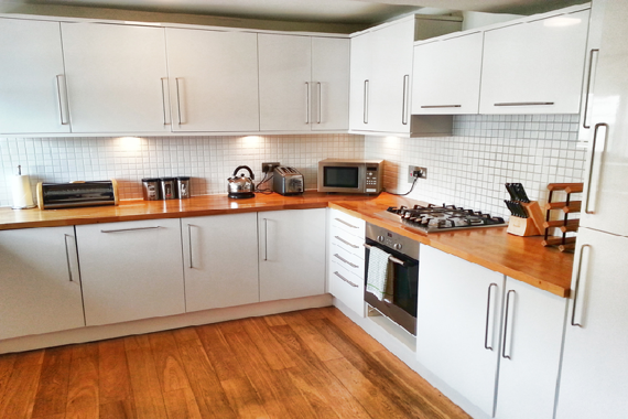 A modern and spacious kitchen in the Superior Three Bedrooms