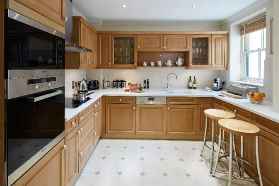 The wooden featured kitchen in a Luxury Three Bedroom