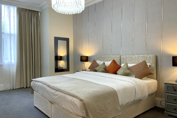 A comfortable and relaxing bedroom in Hertford Street