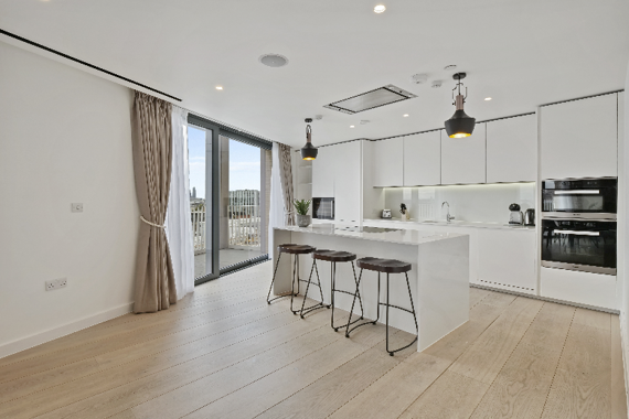 The Penthouse has a fully equipped kitchen and an island!