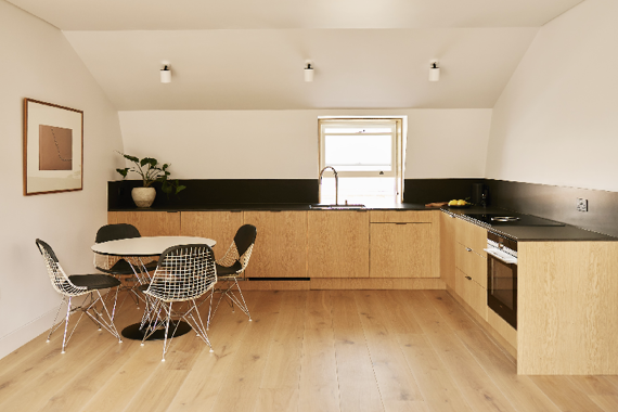 A fully equipped kitchen in the one bedroom apartments