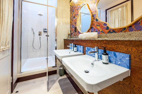 Two basins in the open plan one bedroom suite