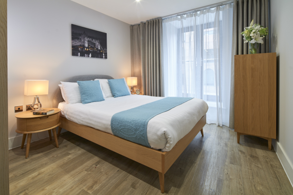 A typical trendy and modern bedroom