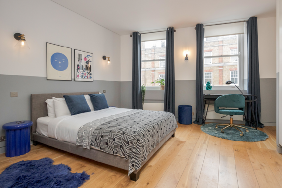 Elegant bedroom adorned with stylish touches and a soothing color palette