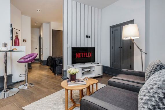 4.	Immerse yourself in a rather spacious and decorative living room, 