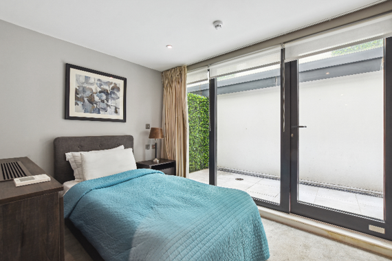 Single bed with direct outdoor space access