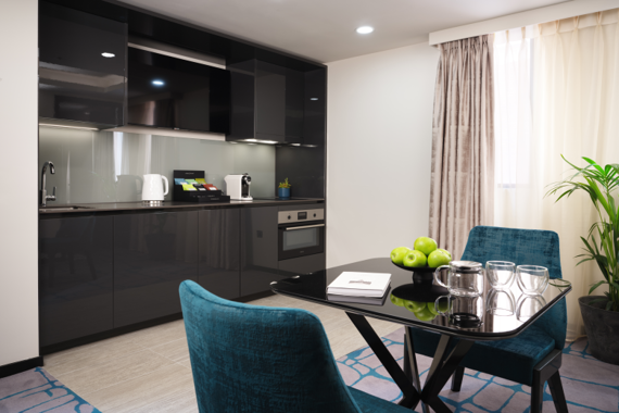 A beautifully furnished  open plan dining and kitchen area