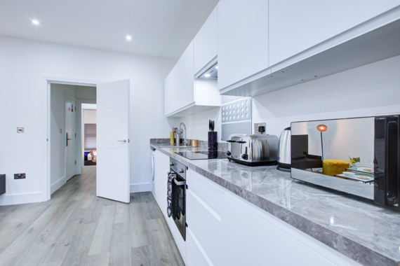 Fully equipped kitchen convenient creating a seamless and inviting atmosphere