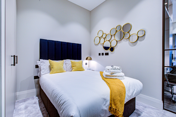 Immerse yourself in a decorative bedroom, adorned with tasteful accents and eye-catching details.