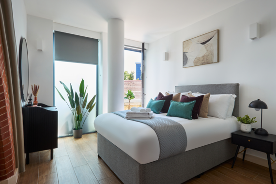 Cozy and inviting bedroom with a comfortable bed and soothing ambiance