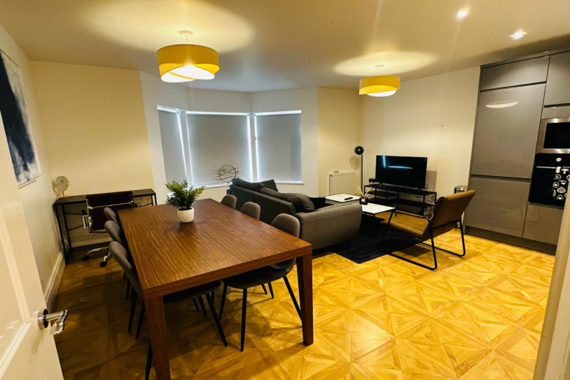 Open-plan kitchen with a spacious layout, ideal for socialising while cooking