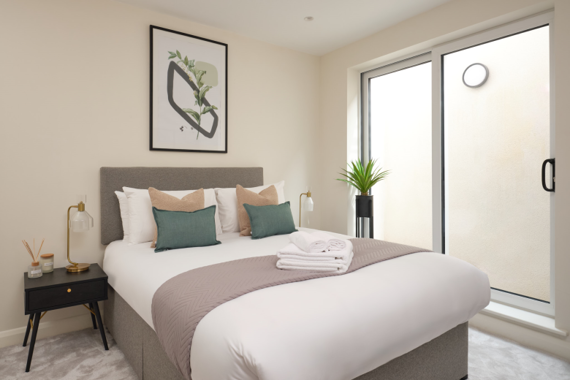 Retreat to a stylish and elegant bedroom, adorned with luxurious touches and a soothing color palette