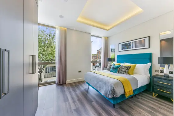 Cozy and inviting bedroom with a comfortable bed and soothing ambiance.