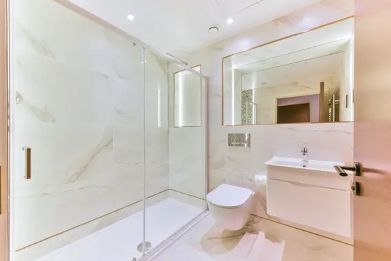Pamper yourself in a luxury bathroom, where indulgence meets elegance through high-end fixtures and sophisticated design