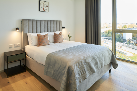 Relax in the spacious double bedroom, offering a restful night's sleep