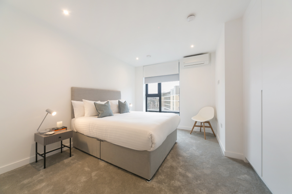 A typical trendy and modern bedroom