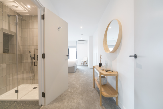 A stylish bathroom and hallway