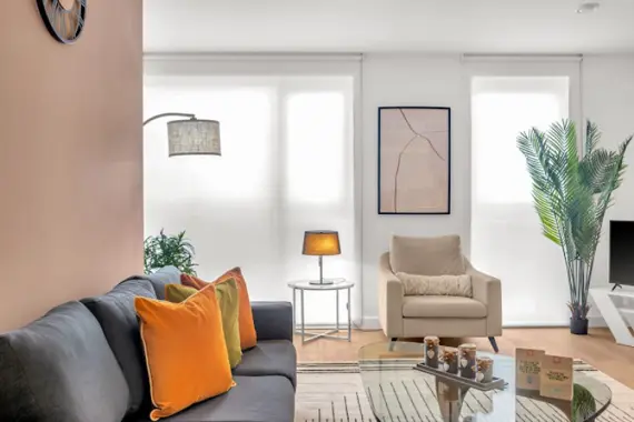 Well-appointed living room in Avant Garde Apartments