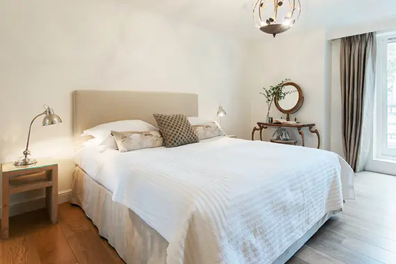 A chic master bedroom in a two bedroom apartment