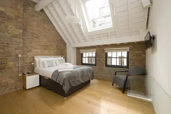 A bright, contemporary bedroom at Arne Street Apartments