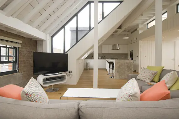 A bright and modern lounge area at Arne Street Apartments