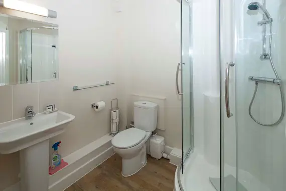 A light shower room in a studio apartment