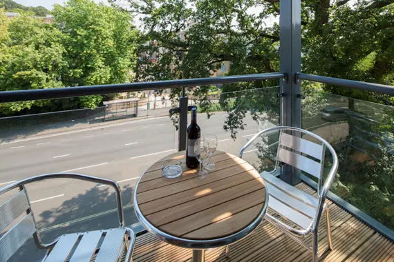 A cute balcony... perfect for watching the world go by