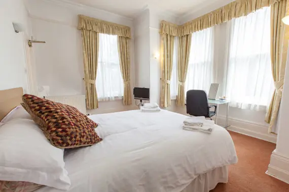 A spacious, light bedroom