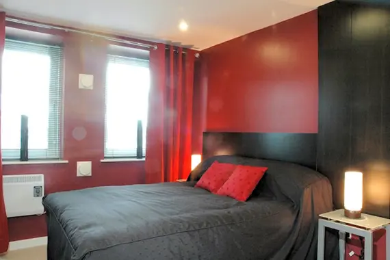 A relaxing double bedroom in a typical two bedroom apartment