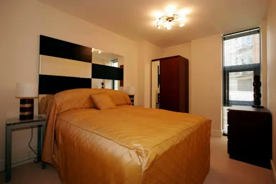 A cosy double bedroom in a one bedroom apartment