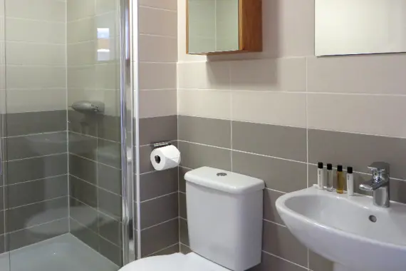 A shiny, spacious shower room