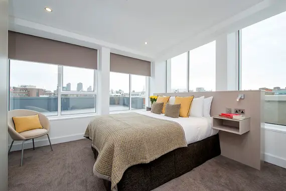 One of the bright, well decorated bedrooms in a two bedroom apartment