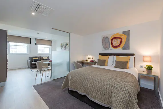 The comfortable, relaxing bedroom area in the premier studio apartment