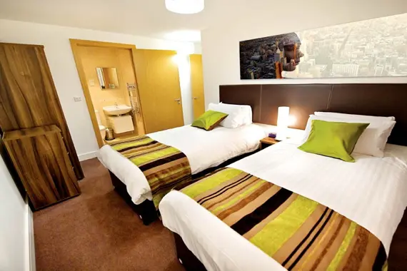 A spacious twin bedroom