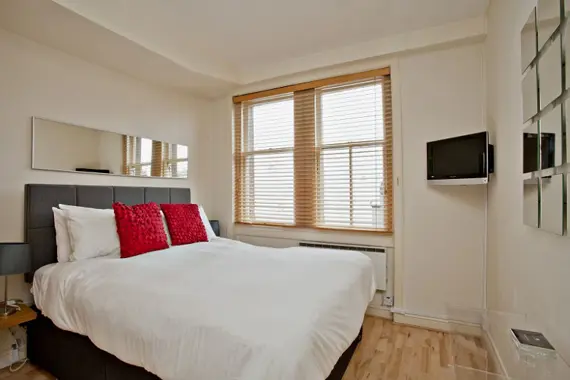 A bright and contemporary double bedroom at Chiltern Street with a Queen size bed