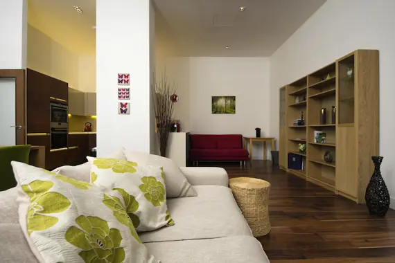 A typical spacious open plan living area and fully-equipped kitchen