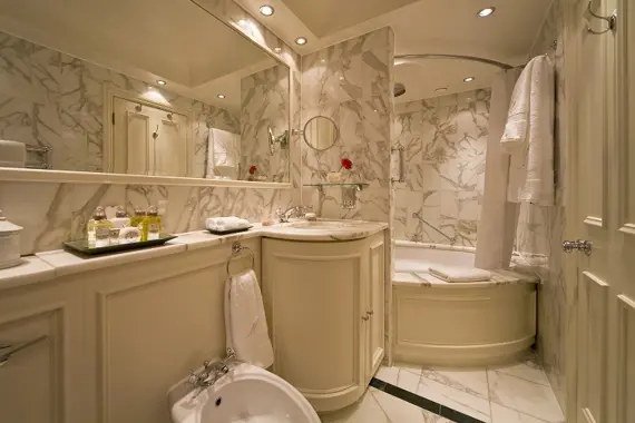 A grand and spacious bathroom in The Edwardian Suite