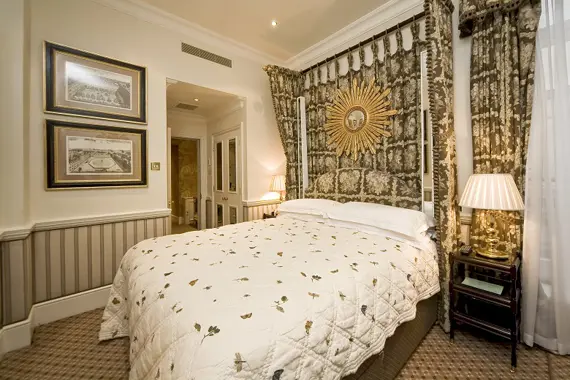 A grand bedroom in the William and Catherine Suite