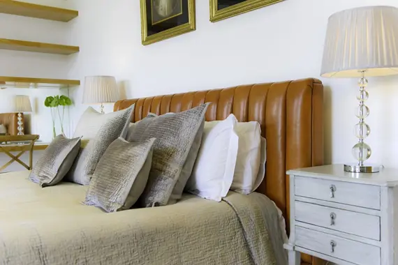 A beautiful, comfy bed in the Upper Garden Suite